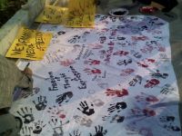 media-solidarity-handprinted-banner-placards-at-kpc-dec8-07.jpg