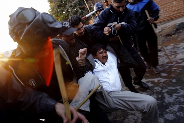 Islamabad Protestor being dragged away by polie