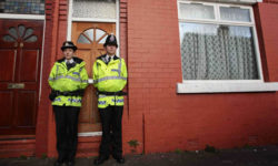 police-outside-a-house-in-manchester-following-arrest-of-10-pakistanis